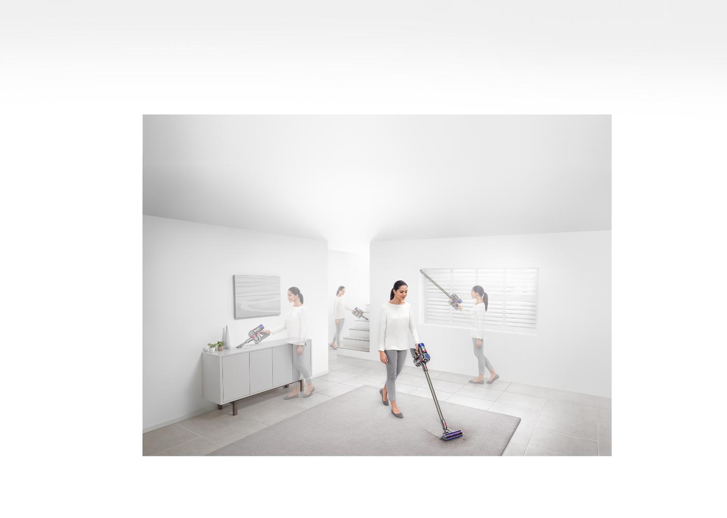 Model using the Dyson V8™ vacuum